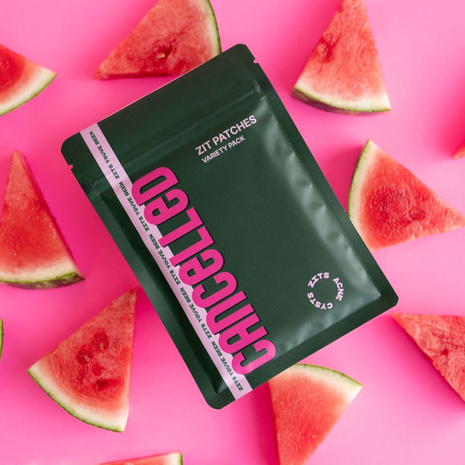 Bag of Benecia zit patches surrounded by watermelon slices on a pink background